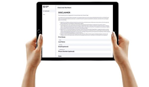 alt="hand held tablet showing EscapeAssist's digital waiver system including custom data collection fields and signature block”
