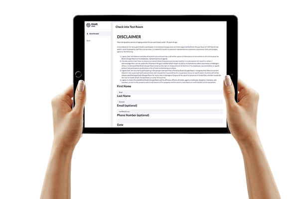 alt="hand held tablet showing EscapeAssist's digital waiver system including custom data collection fields and signature block”