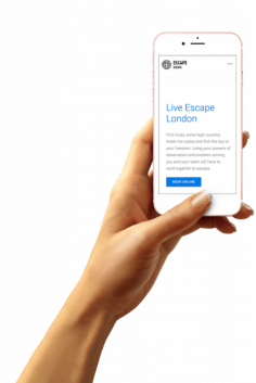 alt="hand held cell phone demonstrating how EscapeAssist's escape room websites load fast on any mobile device or mobile network”